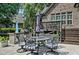 Backyard patio with built in grill and outdoor dining area at 39 Wood Stork Ct, Clayton, NC 27520
