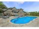 Expansive backyard featuring a beautiful in-ground pool, patio, and outdoor seating, perfect for entertaining and relaxation at 39 Wood Stork Ct, Clayton, NC 27520