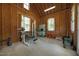 Spacious garage features a workout area with weight equipment and good lighting at 4050 Culbreth Rd, Stem, NC 27581