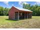 Outdoor shed featuring a simple structure and open sides, useful for storage at 4050 Culbreth Rd, Stem, NC 27581