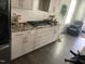 Modern kitchen with granite countertops, subway tile backsplash, and stainless steel appliances at 4108 Cross Timber Ln, Raleigh, NC 27603