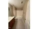 Neutral bathroom featuring a shower-tub combo and a vanity with a marble countertop at 421 Braxman Ln, Holly Springs, NC 27540