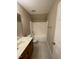 Cozy bathroom equipped with a tub-shower combo and a stylish vanity at 421 Braxman Ln, Holly Springs, NC 27540