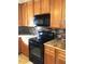 Kitchen featuring stainless-steel appliances and stylish backsplash at 421 Braxman Ln, Holly Springs, NC 27540