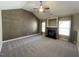 Spacious living room features neutral carpet, a fireplace, and vaulted ceilings at 421 Braxman Ln, Holly Springs, NC 27540