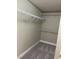 Walk-in closet featuring shelving for optimal storage at 421 Braxman Ln, Holly Springs, NC 27540