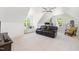 Spacious bonus room with carpet, ceiling fan, window seat and natural light at 4228 Fawn Lily Dr, Wake Forest, NC 27587