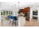 Gourmet kitchen with a center island, pendant lighting, and stainless steel appliances at 4228 Fawn Lily Dr, Wake Forest, NC 27587