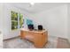 Bright home office featuring a large window with natural light and a neutral area rug at 4228 Fawn Lily Dr, Wake Forest, NC 27587