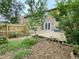 Cozy backyard showcasing a wooden deck, a well-maintained fence, and flourishing greenery, ideal for enjoying nature at 4324 Halliwell Dr, Raleigh, NC 27606