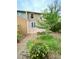 Charming backyard features a wooden deck, colorful flowerbeds, and a lush green garden, perfect for outdoor relaxation at 4324 Halliwell Dr, Raleigh, NC 27606