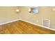 Spacious living area showcasing wood-look flooring and natural light at 4324 Halliwell Dr, Raleigh, NC 27606