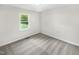 Bedroom features a window with a view and neutral carpet to match all design styles at 448 Chinaberry Ln, Angier, NC 27501