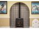 Close-up of the fireplace with stone surround and unique architectural details at 45 Softwood Dr, Franklinton, NC 27525