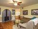 Inviting living room with a cozy fireplace, hardwood floors, and neutral decor at 45 Softwood Dr, Franklinton, NC 27525