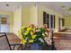 Inviting porch area with potted flowers and seating, perfect for relaxation at 45 Softwood Dr, Franklinton, NC 27525