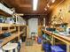 Functional workshop with shelving, workbenches, and ample lighting for various projects and storage at 45 Softwood Dr, Franklinton, NC 27525