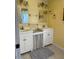 Vintage bathroom with double sinks and ample cabinet space at 462 Ashland Dr, Goldston, NC 27252