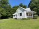 Side view of home showing front porch at 462 Ashland Dr, Goldston, NC 27252