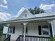 Charming home with a welcoming front porch, gable roof, and classic architectural details at 462 Ashland Dr, Goldston, NC 27252