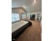 Spacious bedroom with carpet and plenty of natural light from multiple windows at 484 Crow Field St, Roxboro, NC 27574
