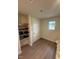 Walk-in closet space with natural light and shelving for optimal organization at 484 Crow Field St, Roxboro, NC 27574