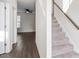 Inviting entryway featuring hardwood floors and a staircase leading to the upper level at 485 Hawksbill Dr, Franklinton, NC 27525