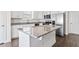 Modern kitchen island with granite counters and stainless-steel appliances at 485 Hawksbill Dr, Franklinton, NC 27525