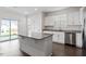 Stylish kitchen with granite countertops, stainless steel appliances and sliding glass door at 485 Hawksbill Dr, Franklinton, NC 27525