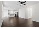 Spacious living room with hardwood floors and open concept kitchen at 485 Hawksbill Dr, Franklinton, NC 27525