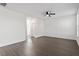 Open living room with hardwood floors and ceiling fan at 485 Hawksbill Dr, Franklinton, NC 27525