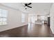 Bright living room with an open layout, hardwood floors, and windows at 485 Hawksbill Dr, Franklinton, NC 27525