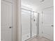 Bathroom featuring a glass shower with bright lighting at 485 Hawksbill Dr, Franklinton, NC 27525
