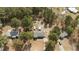 Aerial view of property showcasing the home and surrounding trees with a trampoline in the back at 51 Brafford Estates Dr, Cameron, NC 28326