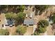 Aerial view of a home featuring a spacious yard surrounded by mature trees at 51 Brafford Estates Dr, Cameron, NC 28326