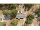 Aerial view of a home with a large, tree-lined yard showcasing the property's layout at 51 Brafford Estates Dr, Cameron, NC 28326