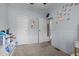 Neutral bedroom with light blue walls, plush carpet, ceiling fan, and ample closet space at 51 Brafford Estates Dr, Cameron, NC 28326