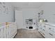 A bedroom with a crib, dresser with changing table, and toy kitchen set at 51 Brafford Estates Dr, Cameron, NC 28326