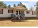 Charming single-story home with a welcoming front porch and attractive exterior at 51 Brafford Estates Dr, Cameron, NC 28326