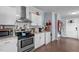 Updated kitchen featuring stainless steel appliances, sleek countertops, and ample cabinet space at 51 Brafford Estates Dr, Cameron, NC 28326