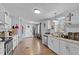 Spacious kitchen with stainless steel appliances, ample counter space, and lots of natural light at 51 Brafford Estates Dr, Cameron, NC 28326