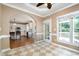 Breakfast nook features tiled floor, lots of natural light and views to the yard at 5113 Linksland Dr, Holly Springs, NC 27540