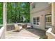 Relaxing deck area with natural tones provides great outdoor living space at 5113 Linksland Dr, Holly Springs, NC 27540