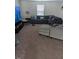 Comfortable living room with plush carpeting, a large sectional sofa, and a TV entertainment center at 512 Crow Field St, Roxboro, NC 27574