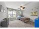 Cozy bedroom with natural light, comfortable carpet, and simple decor, offering a relaxing and serene retreat at 512 Mill Hopper Ln, Apex, NC 27502