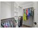 Spacious walk-in closet with ample shelving and hanging space, providing organized storage for a wardrobe at 512 Mill Hopper Ln, Apex, NC 27502