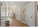 Bright foyer with hardwood floors and white trim throughout at 512 Mill Hopper Ln, Apex, NC 27502
