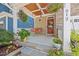 Inviting front porch with swing and charming details at 512 Mill Hopper Ln, Apex, NC 27502