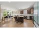Open-concept kitchen and dining area with stainless steel appliances at 512 Mill Hopper Ln, Apex, NC 27502