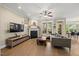 Cozy living room with fireplace and ample natural light at 512 Mill Hopper Ln, Apex, NC 27502